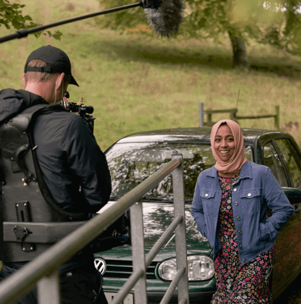Sisters Elli and Izzi from Channel 4's Gogglebox are mouth-open, shocked at something they are watching television.